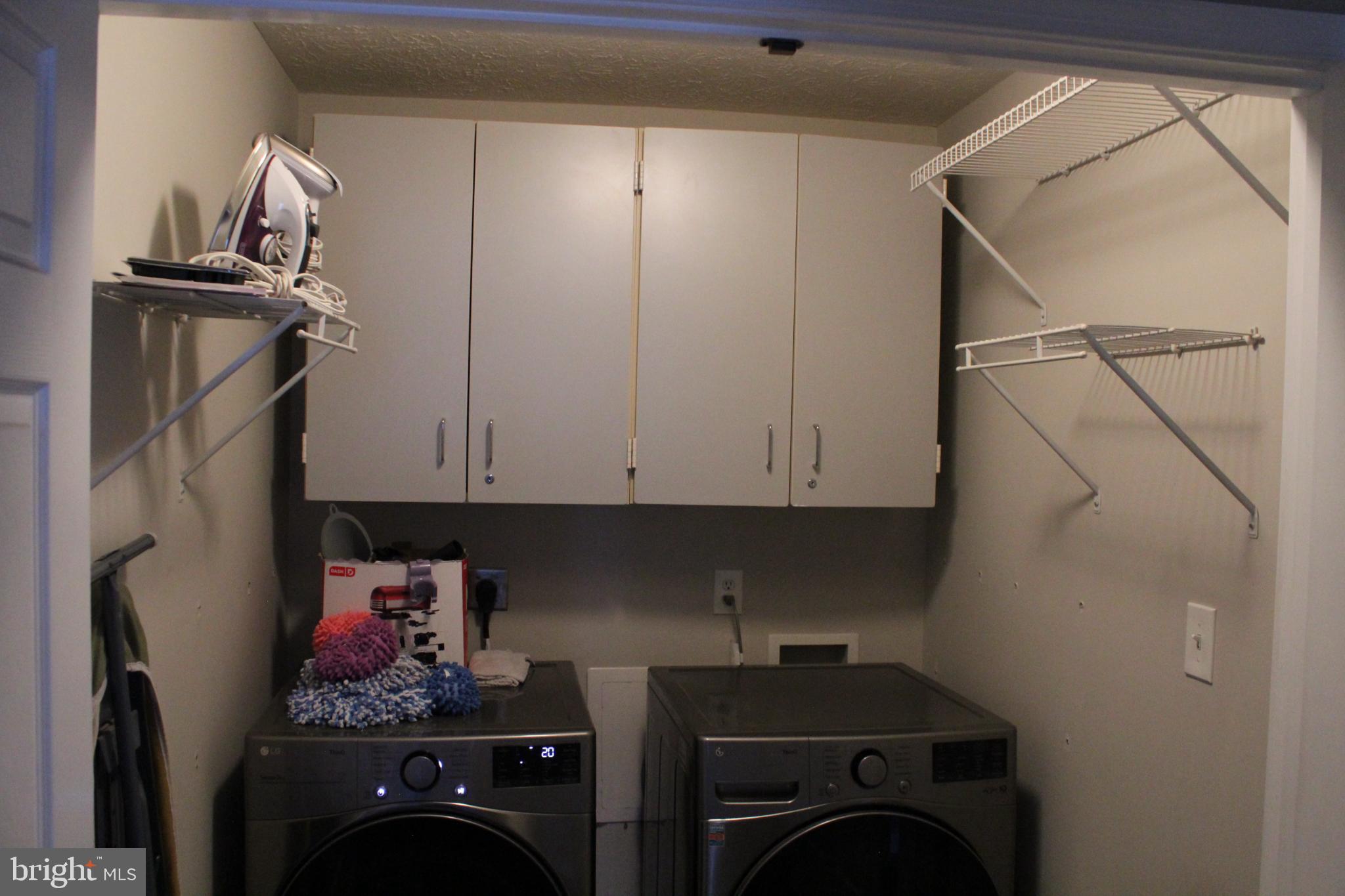 107 Fancy Court Stephens City, VA 22655 - Photo 27 of 36 a view of a storage and utility room with washer and dryer