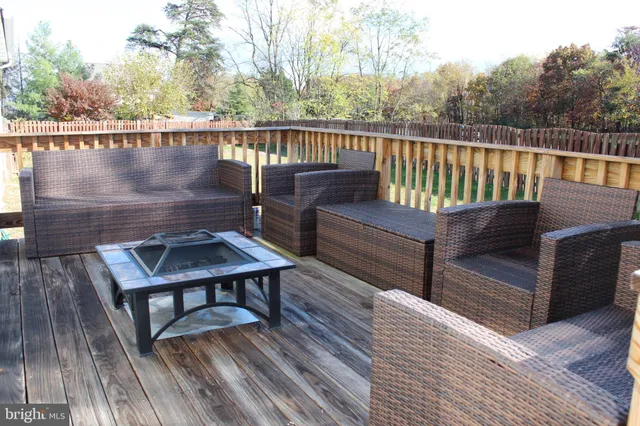 a view of outdoor sitting area with furniture