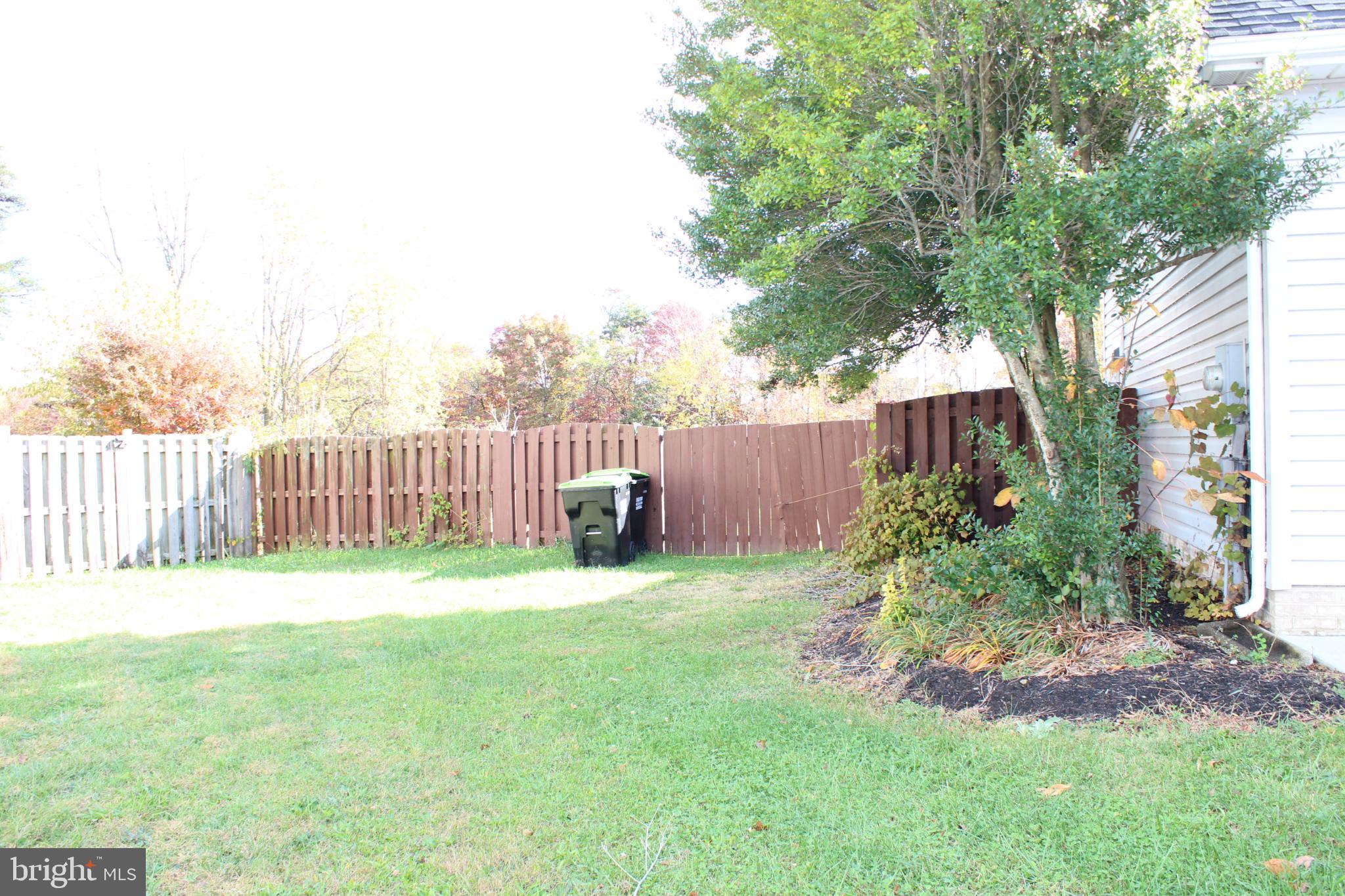 107 Fancy Court Stephens City, VA 22655 - Photo 36 of 36 a view of a backyard with a white fence