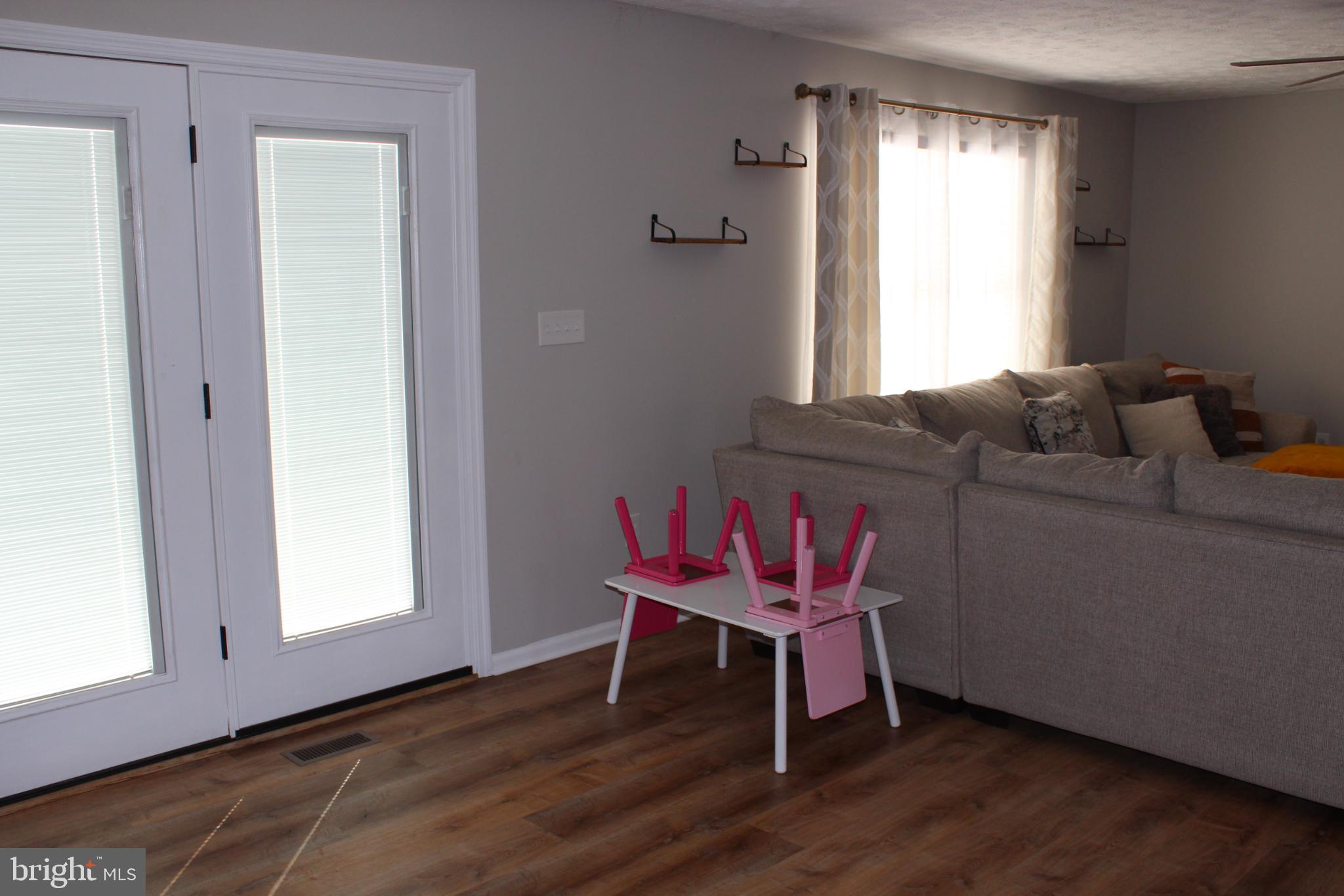 107 Fancy Court Stephens City, VA 22655 - Photo 7 of 36 a living room with furniture and a window