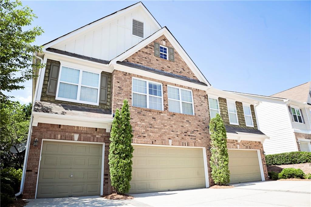 2586 Willow Grove Road, Unit 22 Acworth, GA 30101 - Photo 1 of 1 2 car garage in in the center, unit entrance is on the left side and windows face side and back.