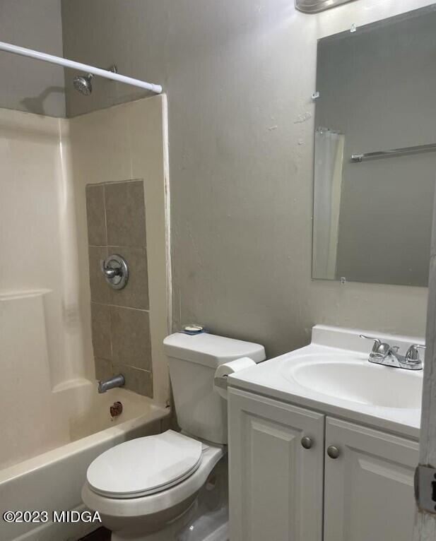2916 Walmar Drive Macon, GA 31206 - Photo 14 of 16 a bathroom with a sink a toilet and shower