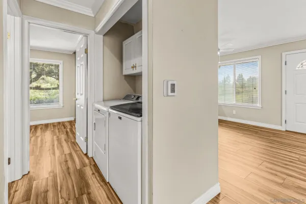 a view of a kitchen from the hallway