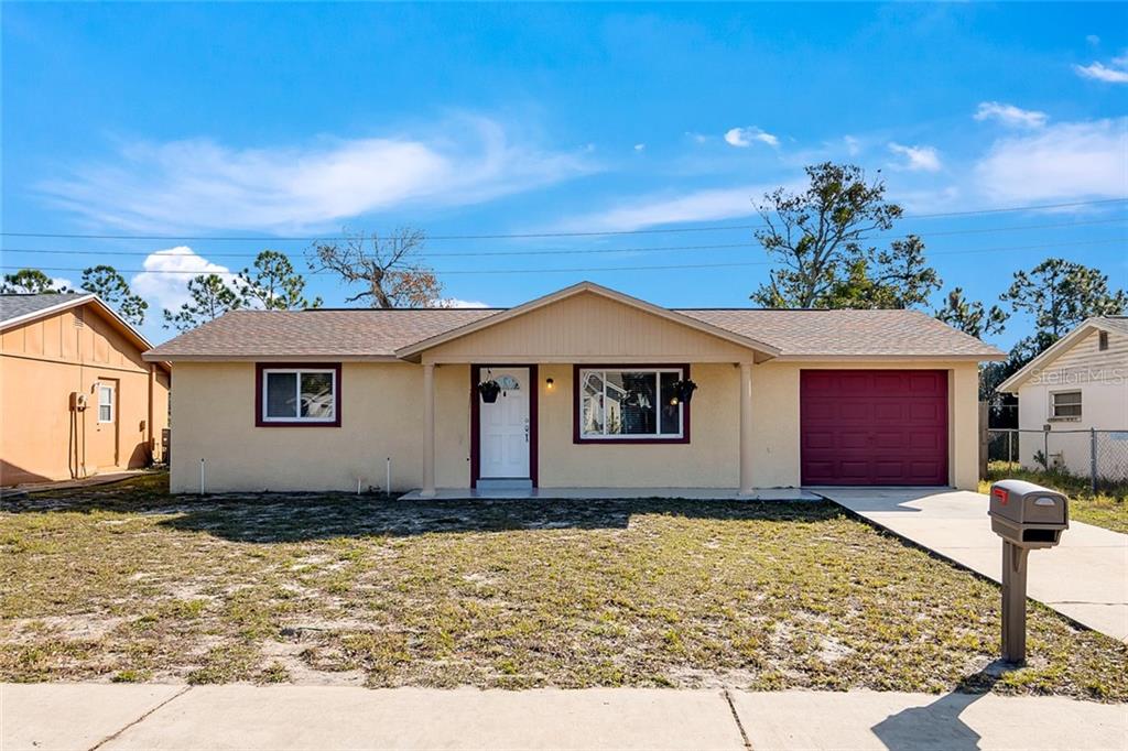11620 Paige Drive Port Richey, FL 34668 - Photo 1 of 1 a view of house with yard