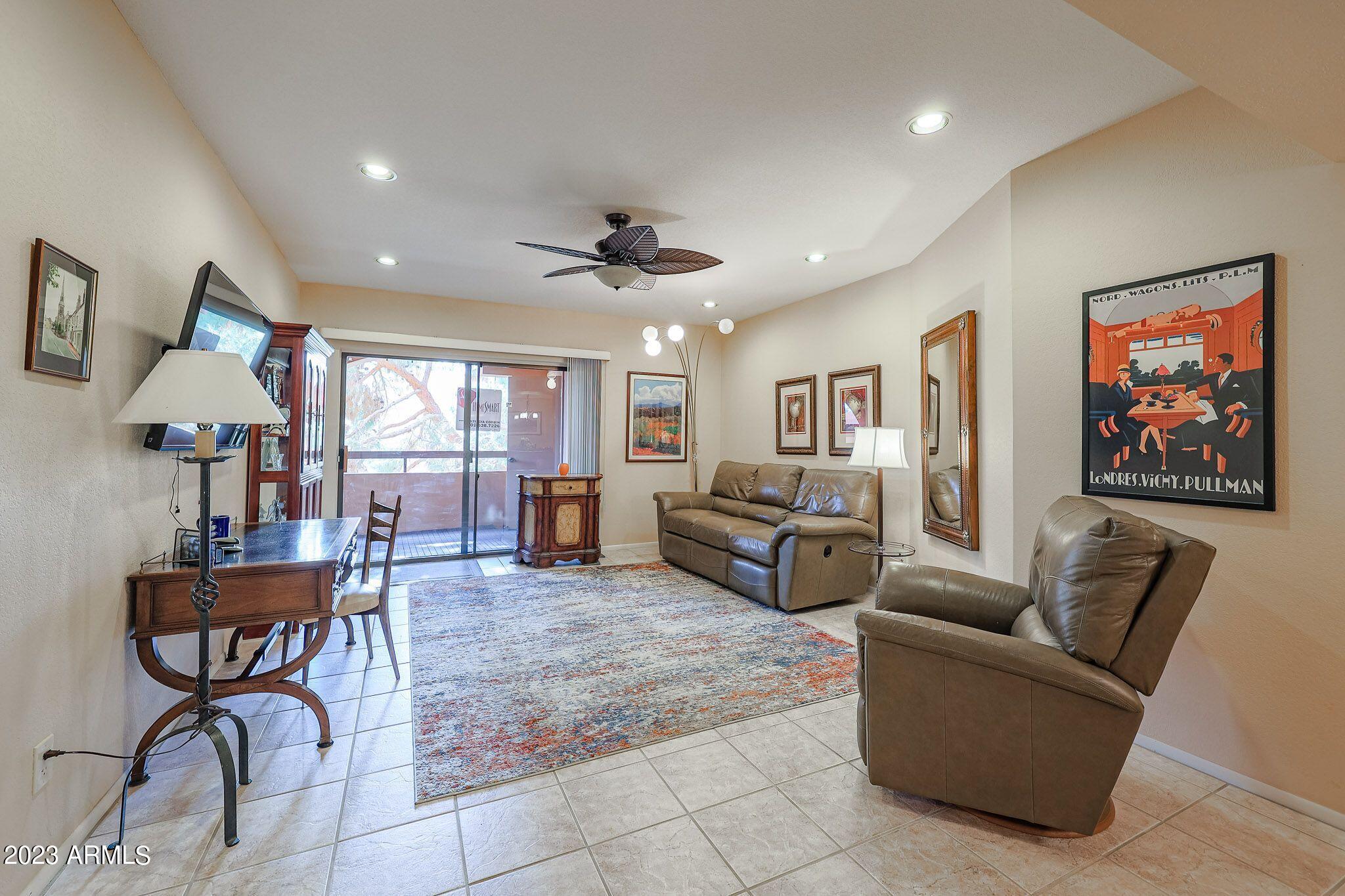 4303 East Cactus Road, Unit 431 Phoenix, AZ 85032 - Photo 1 of 49 9 431-LIVING ROOM TO BALCONY