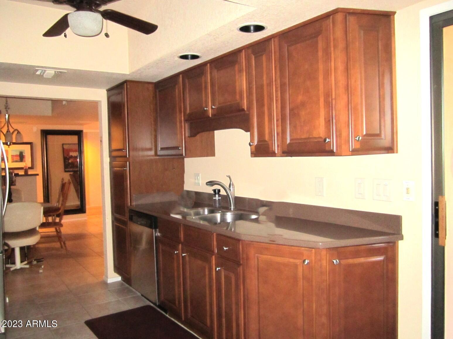 4303 East Cactus Road, Unit 431 Phoenix, AZ 85032 - Photo 14 of 49 9 431 VIEW FROM KITCHEN