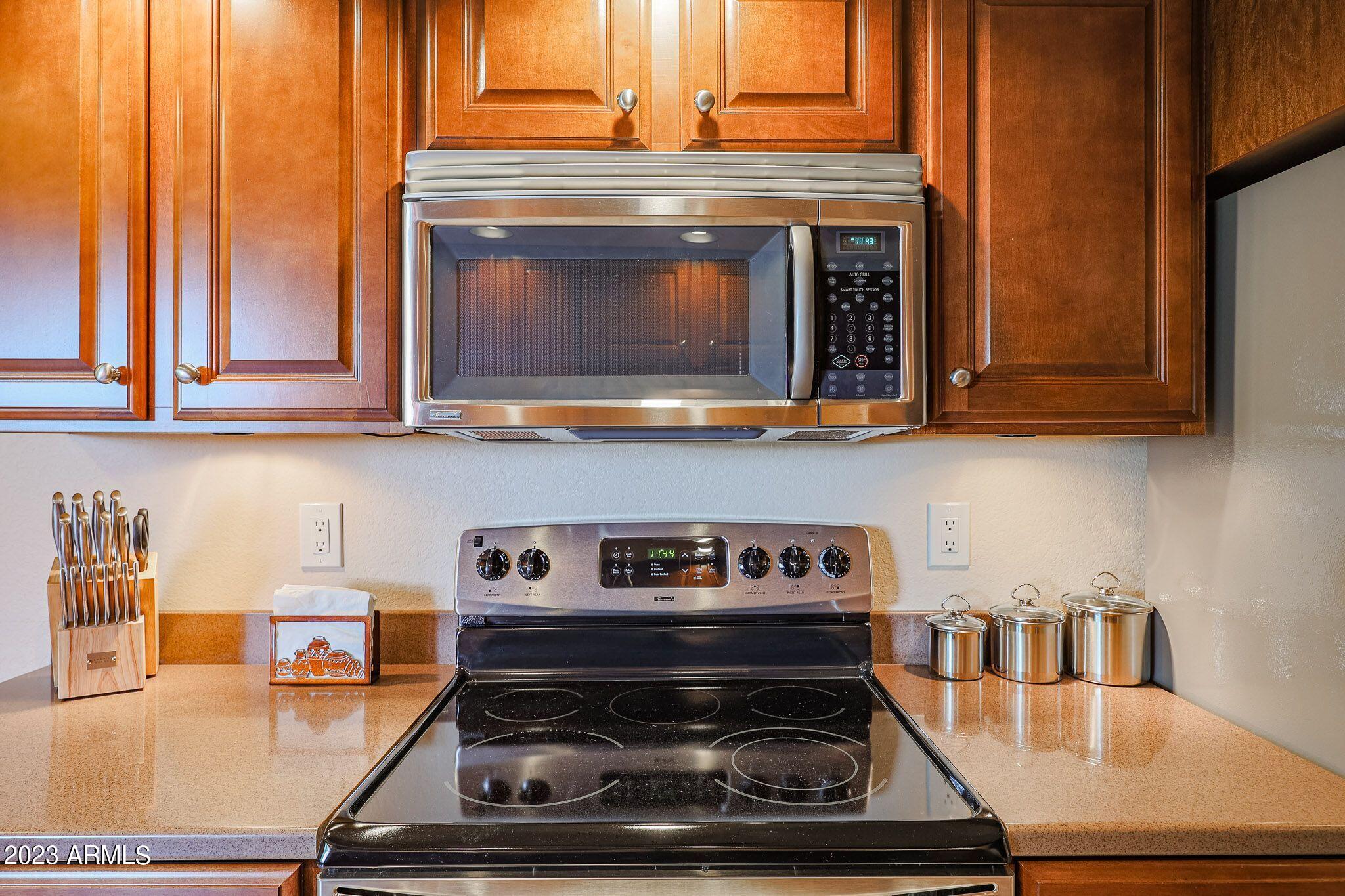 4303 East Cactus Road, Unit 431 Phoenix, AZ 85032 - Photo 17 of 49 9 431-SPARKLING KITCHEN