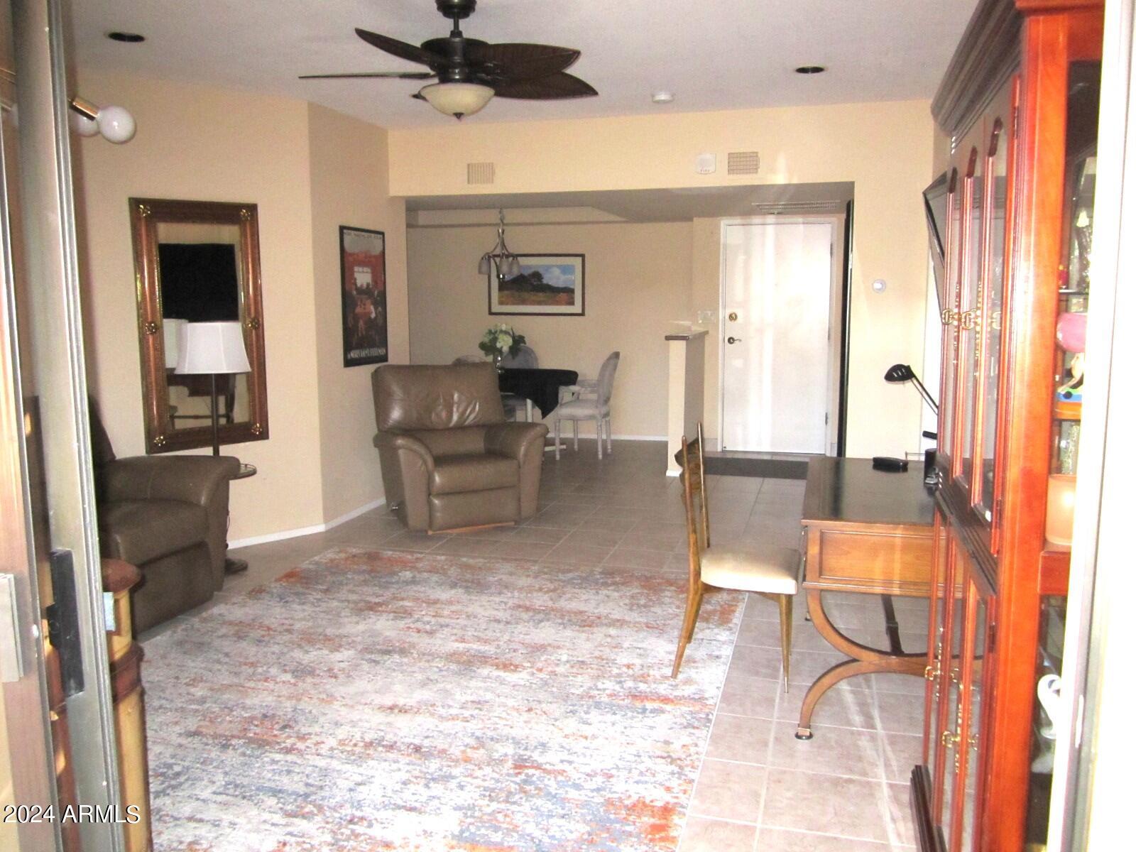 4303 East Cactus Road, Unit 431 Phoenix, AZ 85032 - Photo 7 of 49 9 431 A LIVING AREA WITH RECESSED LIGHTI