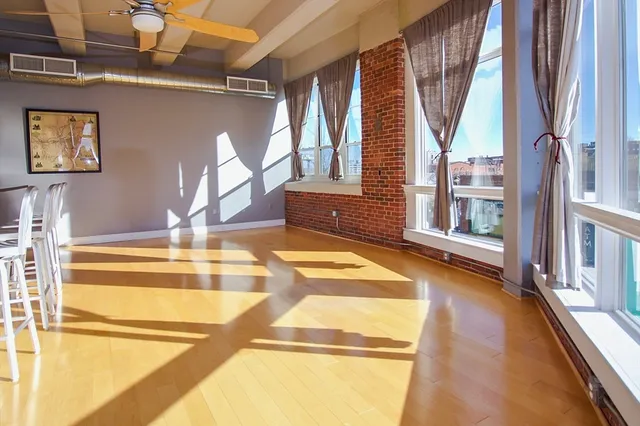a view of swimming pool with seating area