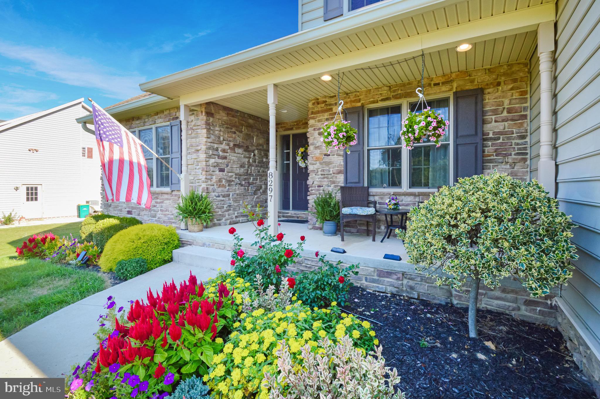 8297 Stottlemyer Road Waynesboro, PA 17268 - Photo 39 of 51 a view of a house that has a flower garden