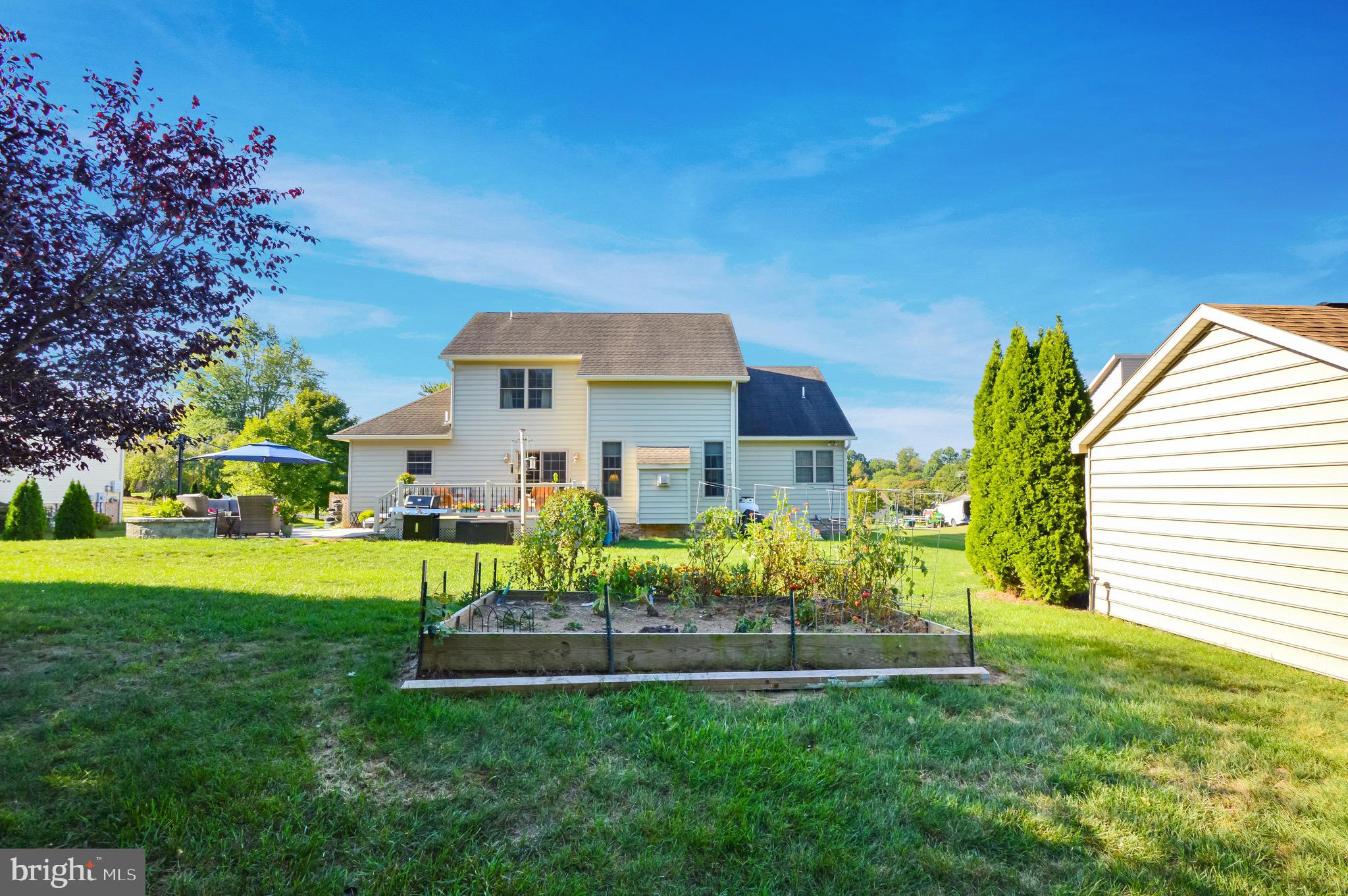 8297 Stottlemyer Road Waynesboro, PA 17268 - Photo 43 of 51 a front view of a house with garden