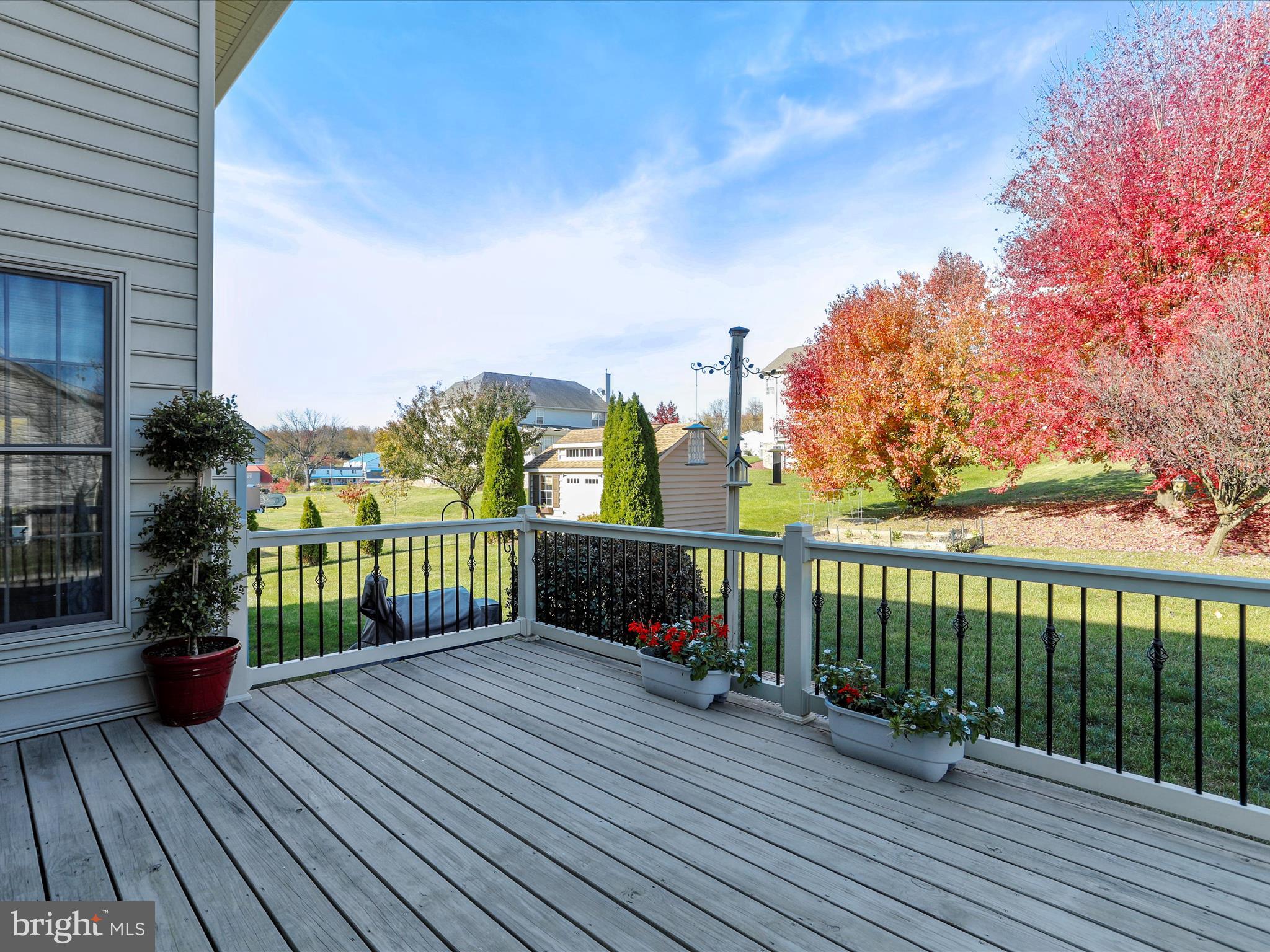 8297 Stottlemyer Road Waynesboro, PA 17268 - Photo 46 of 51 a view of a deck with wooden floor and fence with a large garden