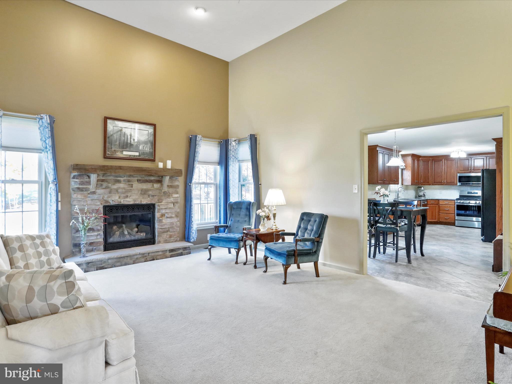 8297 Stottlemyer Road Waynesboro, PA 17268 - Photo 6 of 51 a living room with furniture and a fireplace