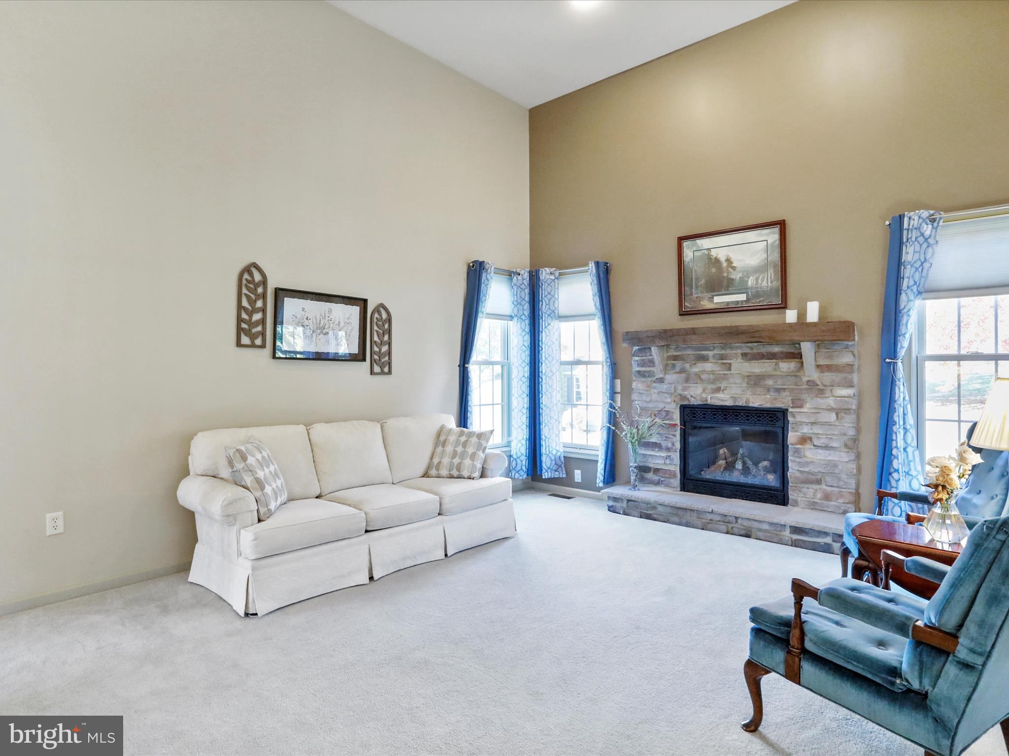 8297 Stottlemyer Road Waynesboro, PA 17268 - Photo 7 of 51 a living room with furniture and a fireplace