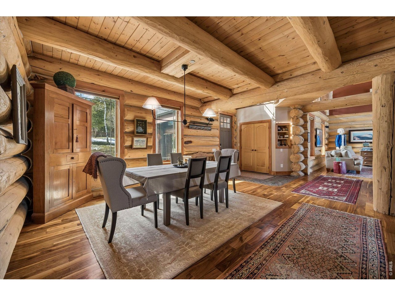 500 Ridge Road Ward, CO 80481 - Photo 9 of 45 a view of a dining room with furniture and wooden floor