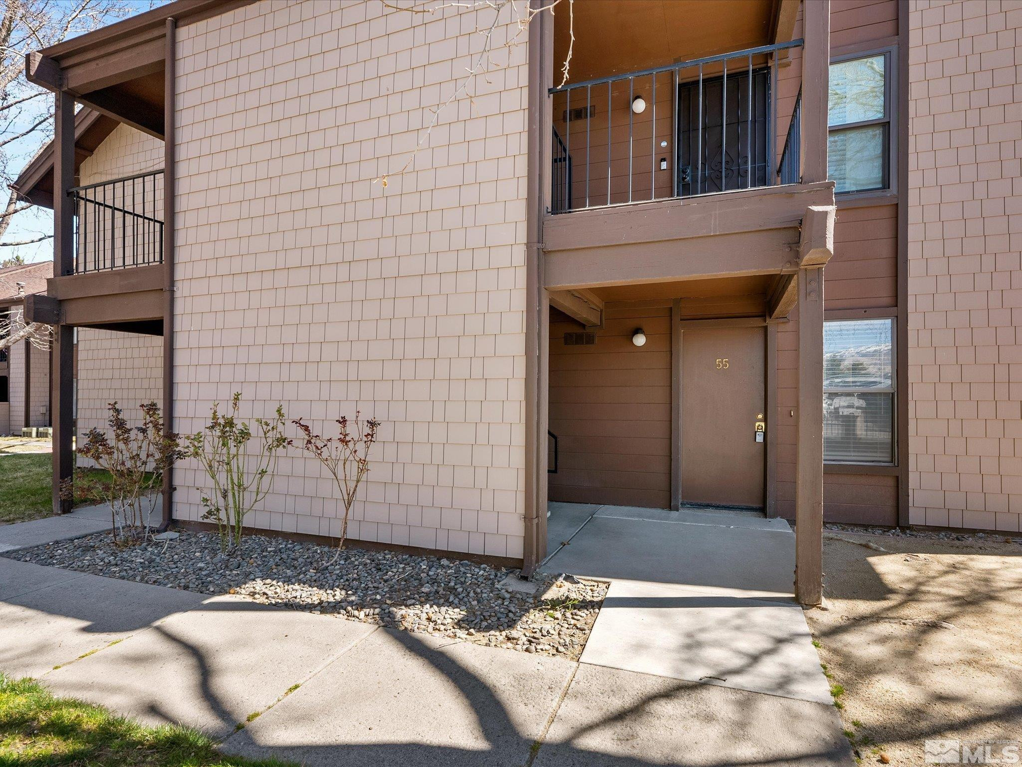 1465 East Peckham Lane, Unit 55 Reno, NV 89502 - Photo 3 of 22 a view of a entryway door