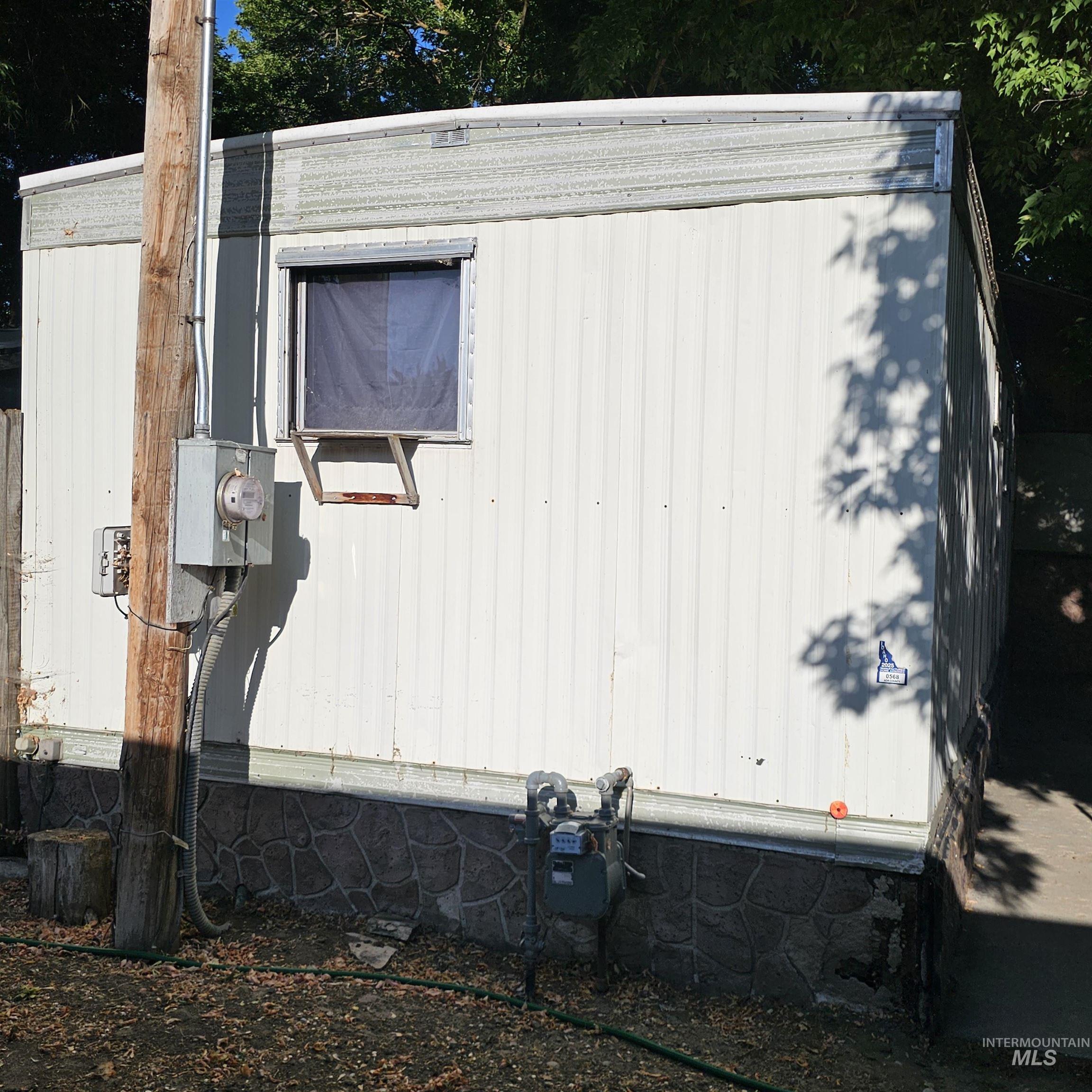 2141 East Syringa Street Eagle, ID 83616 - Photo 23 of 26 View of property exterior with an outbuilding