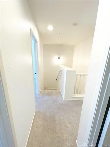 a bathroom with a sink toilet and a mirror