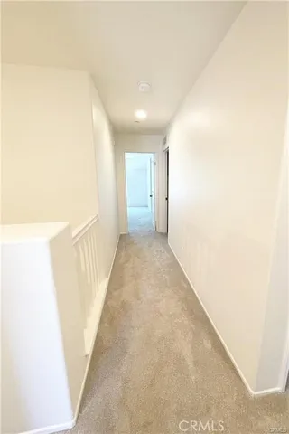 a view of hallway with stairs