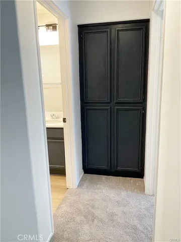 a view of a house with swimming pool and sitting area