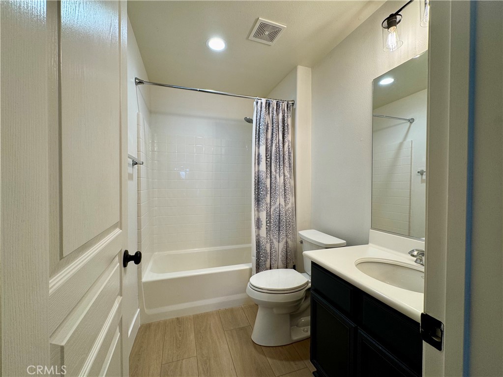 30 Three Vines Court Ladera Ranch, CA 92694 - Photo 28 of 36 a bathroom with a sink toilet and shower