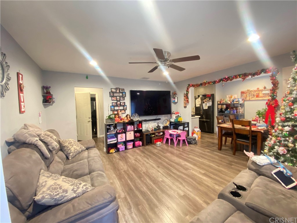 9 Ocotillo Lane Carson, CA 90745 - Photo 2 of 19 a living room with furniture and a flat screen tv