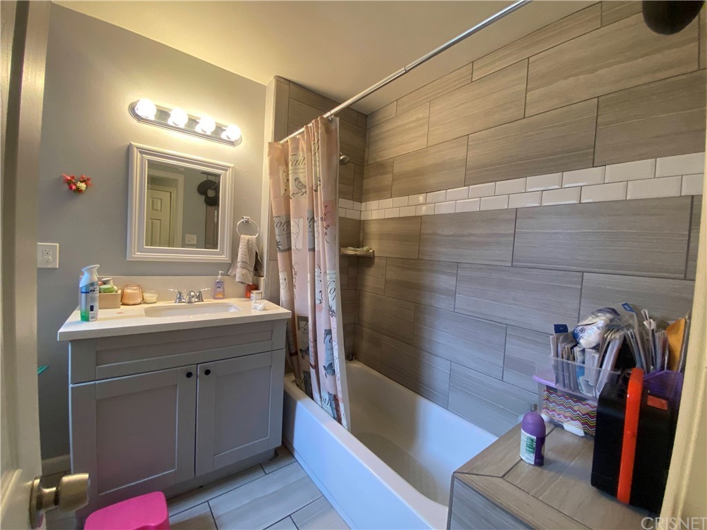 9 Ocotillo Lane Carson, CA 90745 - Photo 3 of 19 a bathroom with a sink and a tub