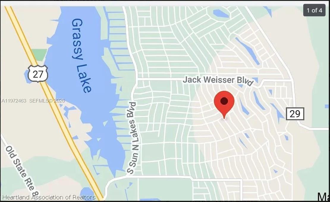 342 Gloaming Drive Lake Placid, FL 33852 - Photo 4 of 4 a bathroom with a sink and a mirror