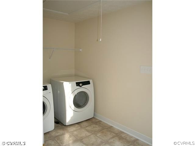 23 Winding Ridge Way Bumpass, VA 23024 - Photo 7 of 15 a utility room with dryer and washer