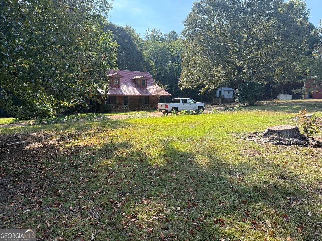 1129 County Road 533 533, AL 36280 - Photo 5 of 19 a view of a house with a yard