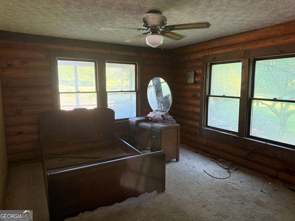 1129 County Road 533 533, AL 36280 - Photo 10 of 19 a room with furniture and windows