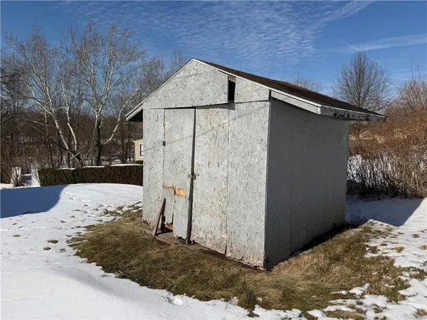 a view of a house covered in snow