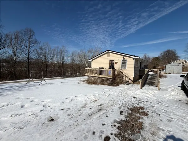 a view of a backyard of snow