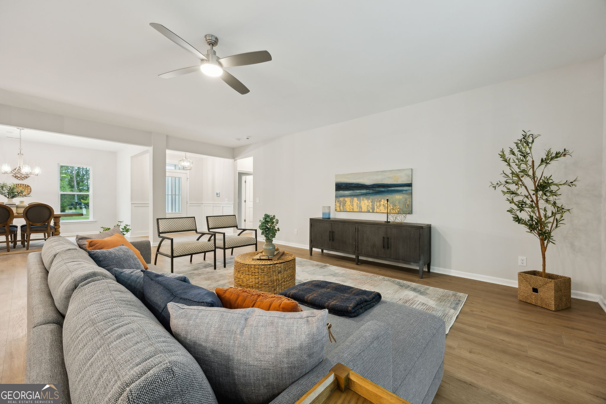 109 Tidal Marsh Way St. Marys, GA 31558 - Photo 13 of 71 a living room with furniture a window and a flat screen tv