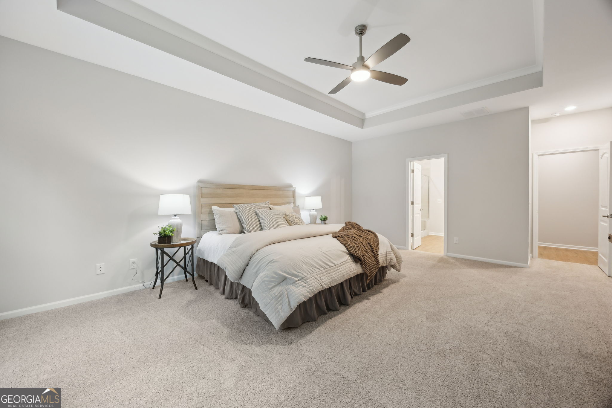 109 Tidal Marsh Way St. Marys, GA 31558 - Photo 28 of 71 a bedroom with a bed and a chandelier