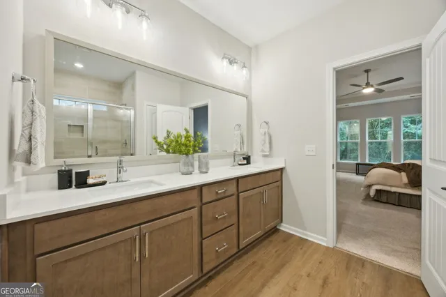 a view of a dining room with furniture and a window