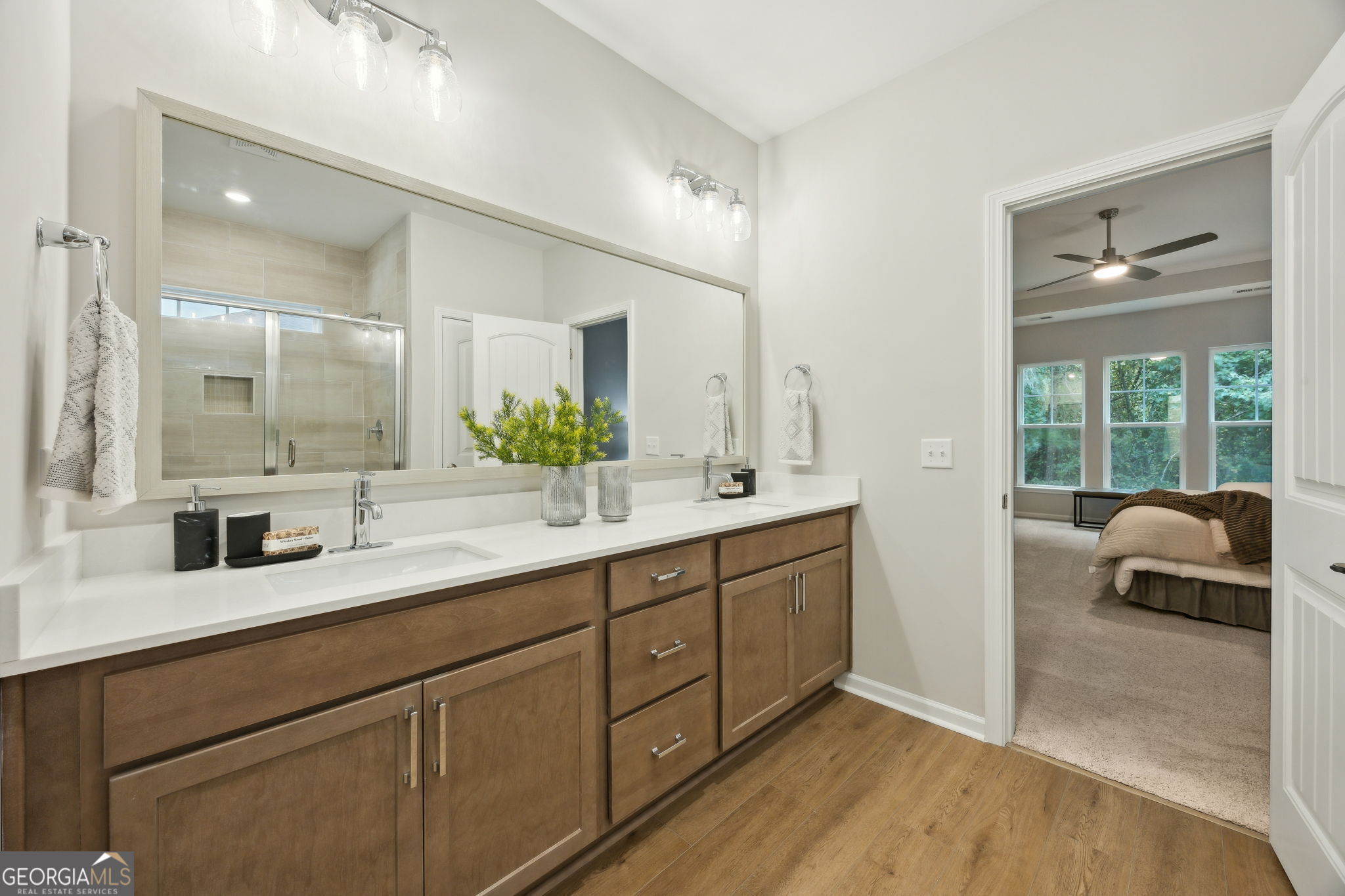109 Tidal Marsh Way St. Marys, GA 31558 - Photo 31 of 71 a en suite bathroom with double sink and a large mirror
