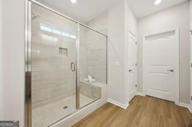 a view of staircase with white walls