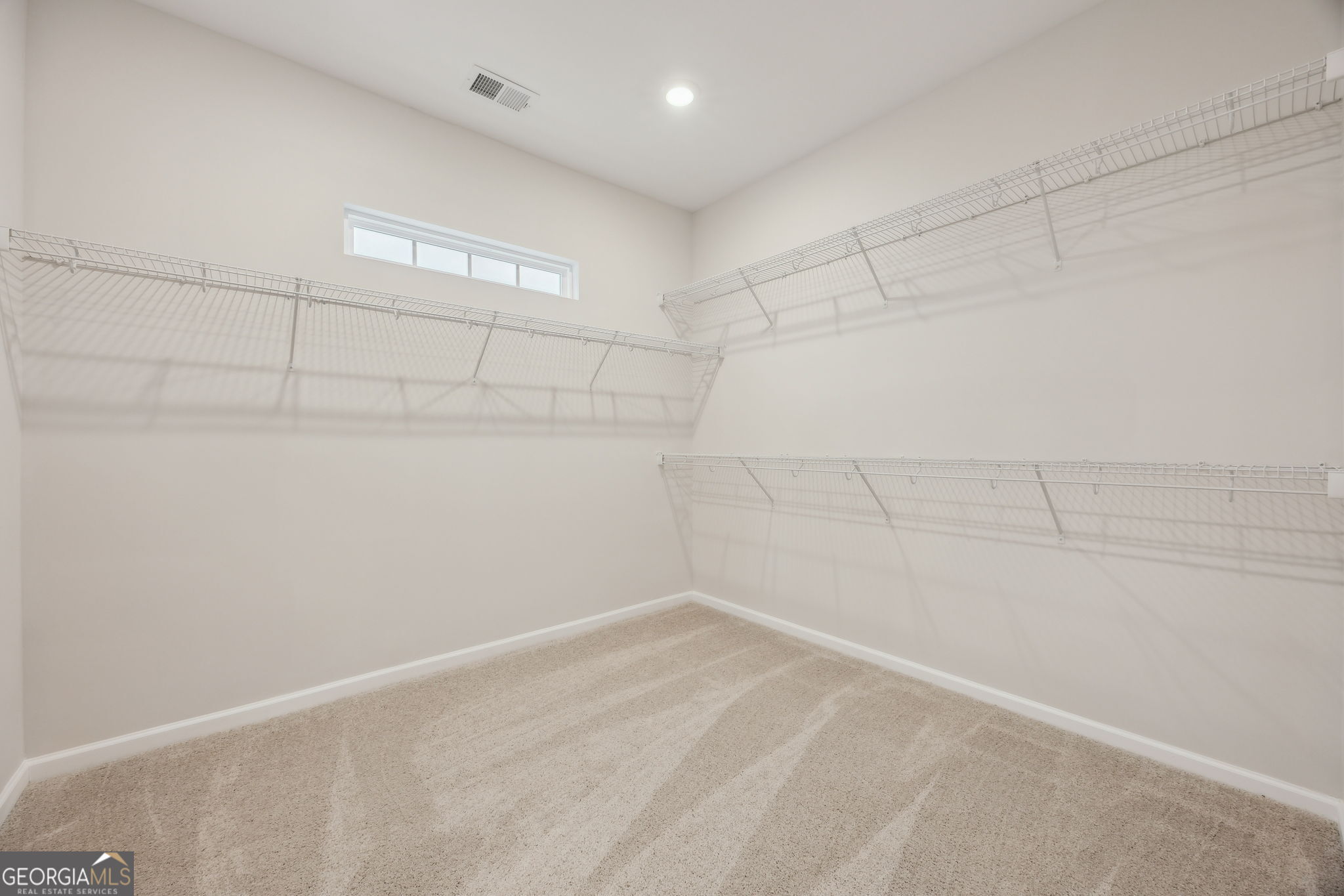 109 Tidal Marsh Way St. Marys, GA 31558 - Photo 34 of 71 a view of a room with racks on the wall