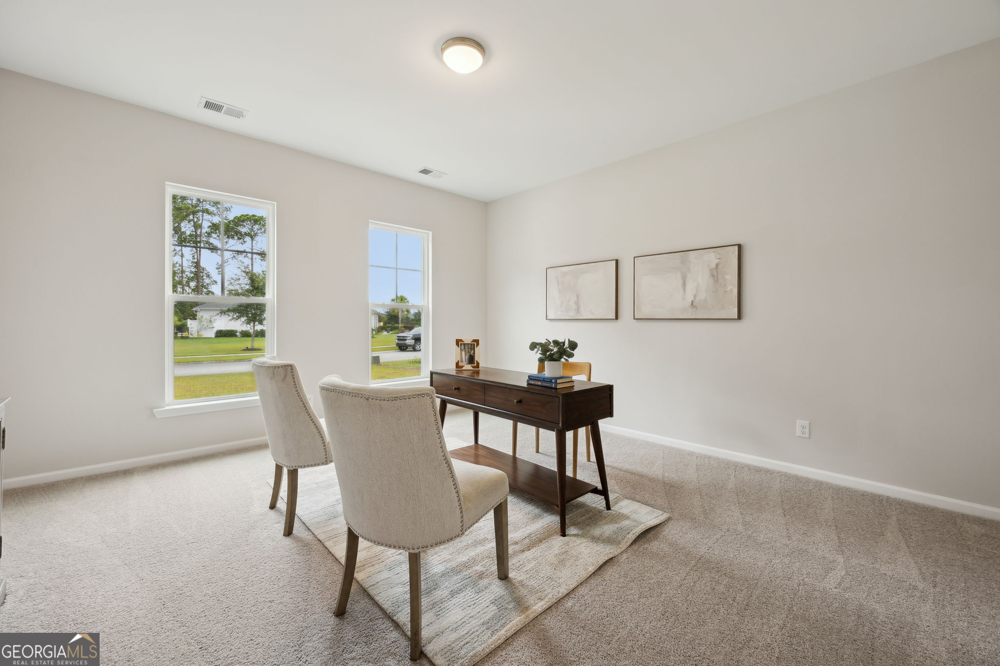 109 Tidal Marsh Way St. Marys, GA 31558 - Photo 39 of 71 a view of a dining room with furniture and a window