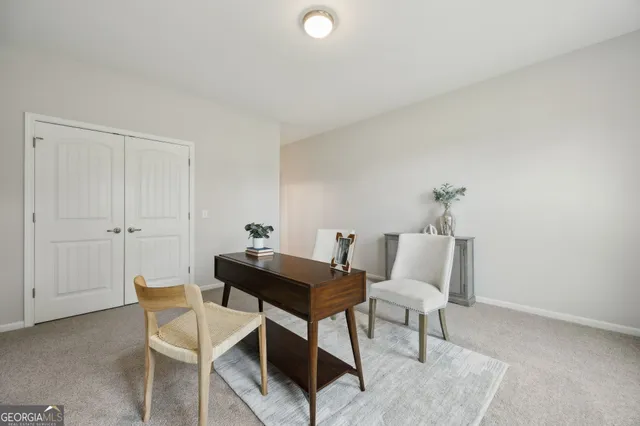 a view of a room with porch and wooden floor