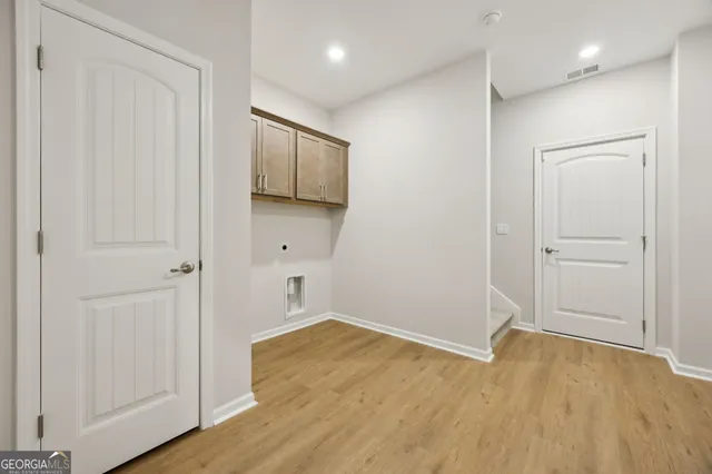 a living room with furniture a fireplace and a table