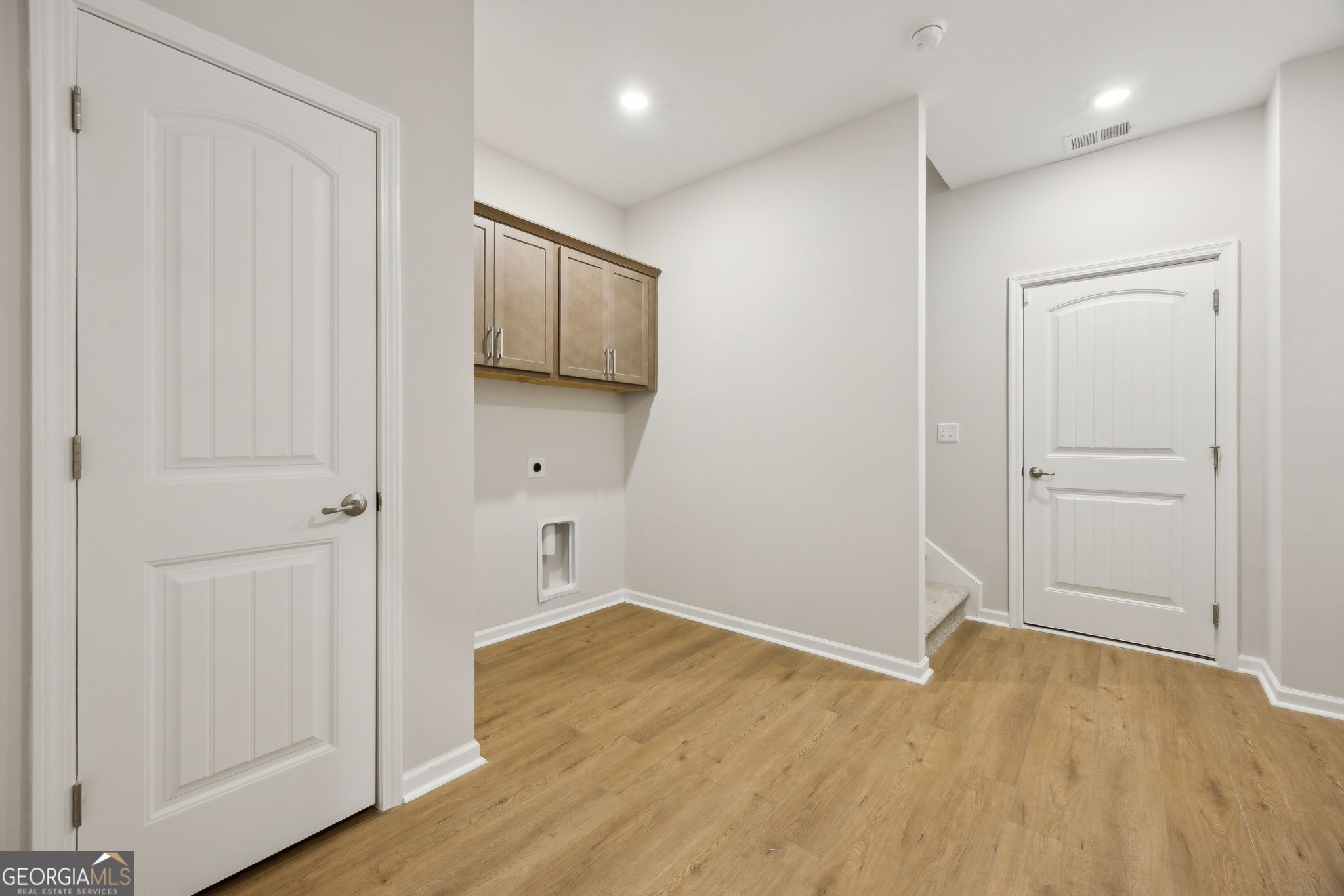 109 Tidal Marsh Way St. Marys, GA 31558 - Photo 50 of 71 an empty room with wooden floor and windows