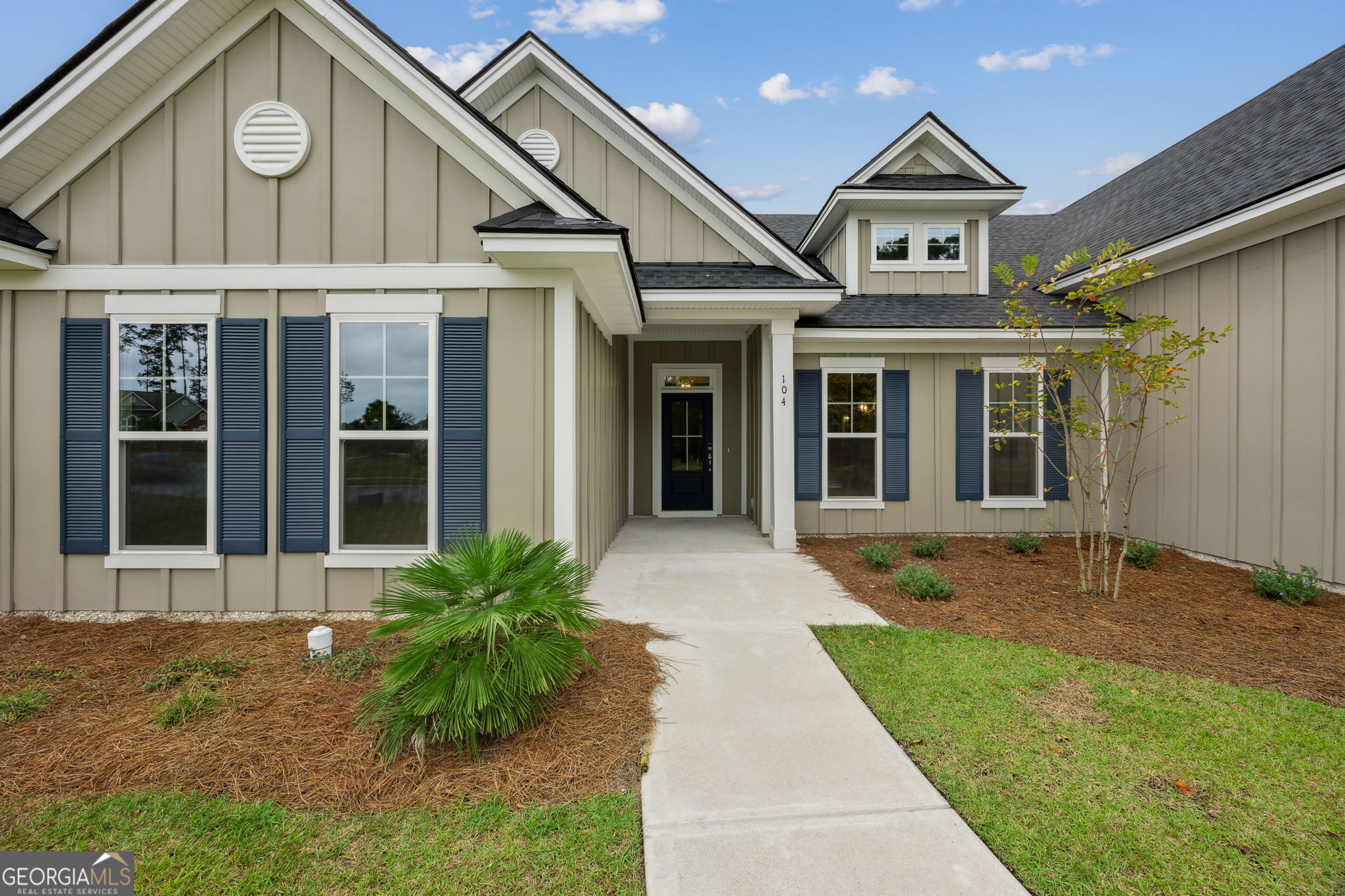 109 Tidal Marsh Way St. Marys, GA 31558 - Photo 5 of 71 a front view of a house with a yard