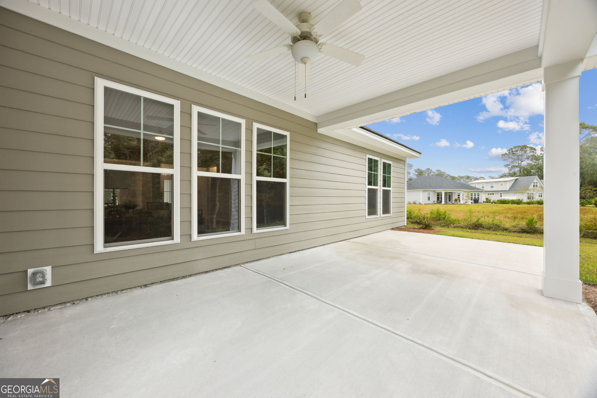 109 Tidal Marsh Way St. Marys, GA 31558 - Photo 54 of 71 a view of an empty room with a fireplace and a window