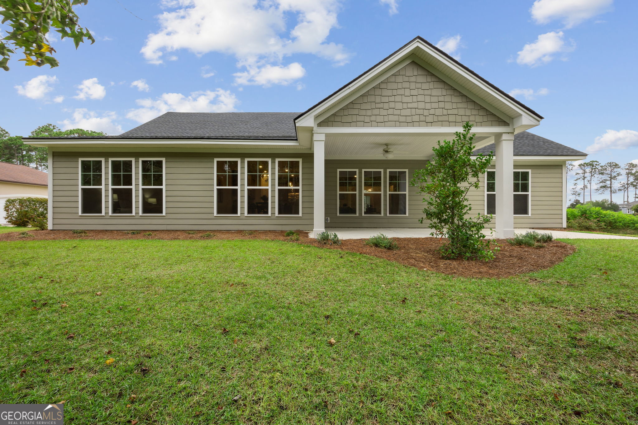 109 Tidal Marsh Way St. Marys, GA 31558 - Photo 57 of 71 front view of a house with a yard