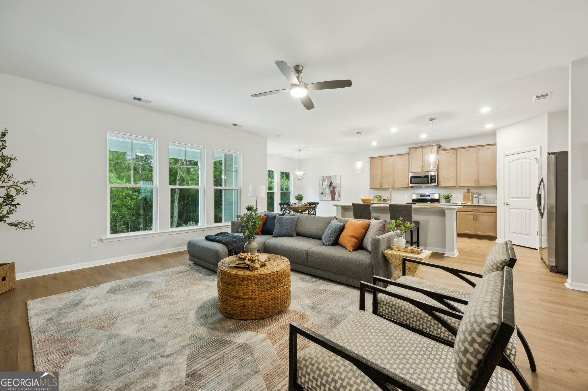 109 Tidal Marsh Way St. Marys, GA 31558 - Photo 10 of 71 a living room with furniture and a large window