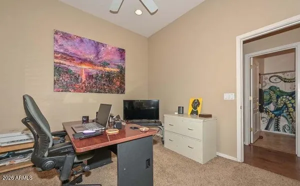 a view of backyard with outdoor seating and plants