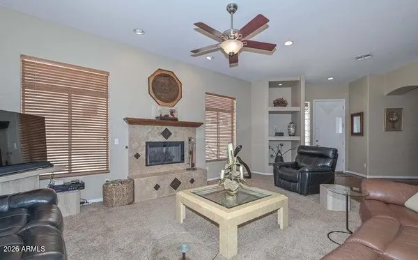 a kitchen with granite countertop a sink and cabinets