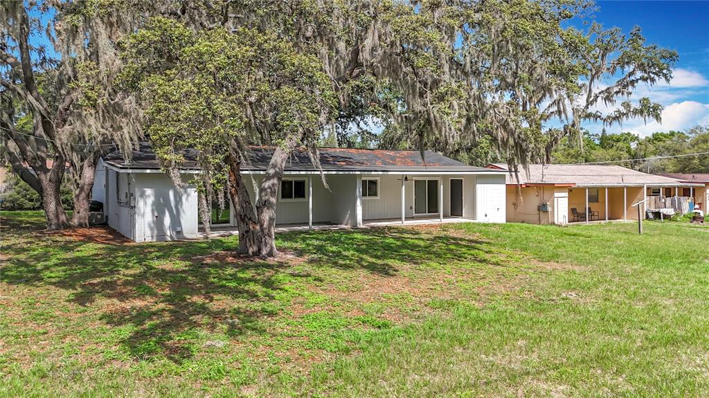 1307 Eagleview Drive Brandon, FL 33510 - Photo 21 of 27 a front view of a house with a garden